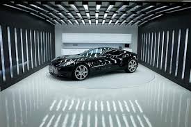 Pin By Didier Theard On Cars And Other Classy Modes Of Transportation Car Showroom Interior Car Showroom Design Luxury Garage