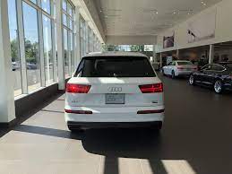Rear View Of Hatch And Tail Lights Of The 2018 Audi Q7 In Carrara White Vehicle Available At Audi Of Bridgewater Nj Used Luxury Cars Audi Dealership Audi