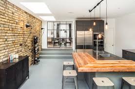 Although newbuild walls are usually not made from brick, there are still many things you can do to give the kitchen an industrial look. Industrial Kitchen Fulham With Brick Wall And Critall Style Sliding Doors Modern Kuche London Von Emr Architecture Houzz