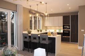 From Arena Kitchens In Ireland A Siematic Kitchen Of Contrasts With Upper Cabinets In White Tall And Base In A Dark Venee Upper Cabinets Life Kitchen Kitchen
