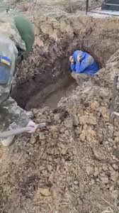 UkrainianUkroNazi burying civilian alive - LiveGore.com