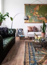 17 A Dark Green Tufted Leather Sofa For