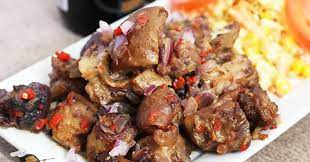 Asun Served With Salad Asun Is Simply Goat Recipes Nigerian Food Spicy Recipes