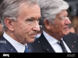 Bernard Arnault, Maurice Levy and Emmanuel Macron. French President  Emmanuel Macron with French Junior Minister in charge of Digital Mounir  Mahjoubi and French High Education and Research Minister Frederique Vidal  visiting the