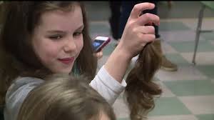 Harrisburg school hosts hair-cutting event to honor Dr. Martin Luther King,  Jr.