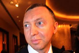 Russian metals moguls Deripaska and Cherney settle Rusal stake spat