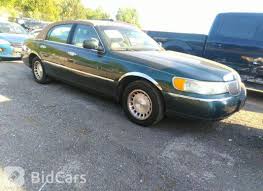 Image result for Charcoal Green 1999 Town Car