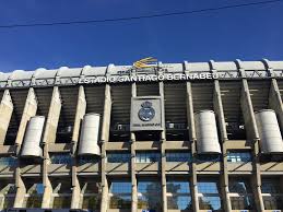 Outside view of santiago bernabeu stadium with a logo of real madrid. Estadio Santiago Bernabeu Real Madrid C F Stadium Journey