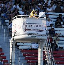 Green means go, so when a driver sees this flag, he yellow flag: Low Profile Wise Carries Flag For Nascar Fans Everywhere Las Vegas Review Journal