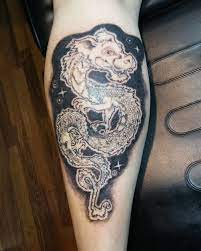 Falcor The Luck Dragon Never Ending Story Tattoo By Addam North Tattoos Story Tattoo Falcor Luck Dragon Tattoo
