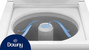 Fabric softener dispenser for easy distribution to load. How To Use Downy Fabric Softener In Top Load Machines Downy Youtube