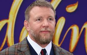 Ever since guy ritchie exploded into the independent cinema landscape in the late 1990s, he's been one of the signature auteurs of the crime genre, injecting a particular blend of style and. Guy Ritchie Banned From Driving After Youtuber Catches Him Texting