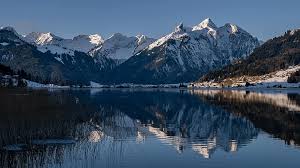 Already back in 1797, johann wolfgang von goethe had the idea of creating a reservoir in the area where the sihlsee lake is now located. Sihlsee Water Mirroring Mountains Snow Reed Nature Blue Bank Wintry Winter Pikist