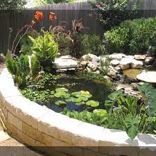 10 Beautiful Koi Pond Designs You Can Build To Complement Your Backyard Koi Ponds Designs No 1701 Ko Fish Pond Gardens Ponds Backyard Pond Landscaping