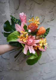Modern Tropical Wedding Bouquet Featuring Ginger Protea Orchid Mini Pineapples Anthuriu Tropical Wedding Bouquets Tropical Wedding Tropical Bridal Bouquet