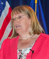 A New Look for RHIC & Sharper View of QCD: Looking Back at the 2014  RHIC-AGS Users' Meeting