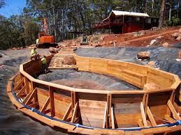 Level, but for a longer wall, rent a builder's level. Image Result For Retaining Wall For Natural Pool Natural Pool Natural Swimming Pools Natural Swimming Ponds