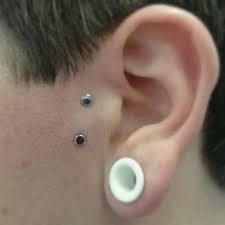 Fresh Vertical Tragus Piercing On Anthony Today With High Polish Titanium Disks From Anatometal Tragus Piercings Vertical Tragus Piercing Vertical Tragus
