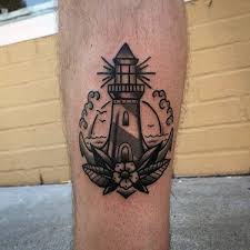 Lighthouse tattoo is located at 328 n. 40 Traditional Lighthouse Tattoo Designs For Men Old School