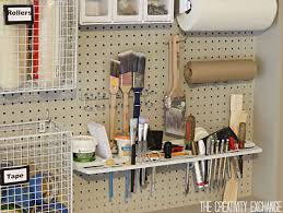 Organizing The Garage With Diy Pegboard Storage Wall Pegboard Storage Garage Storage Bins Home Depot Garage Storage