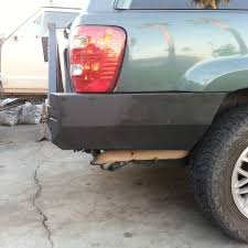 Looking for a bumper for your jeep® that protects the rear end, has a receiver hitch, a tire carrier, and looks great? 99 04 Wj Grand Cherokee Rear Bumper Kit Diy Off Road