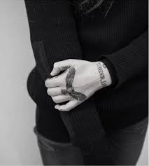 Are there any tattoos with an eagle on them? Eagle Tattoo Designs On Wrist