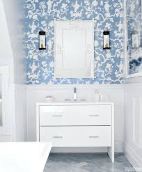 A Powder Blue Vanity And Mermaid Inspired Tiles Give A Bathroom A Modern Look Style At Home Bathroom Decor Bathroom Wallpaper Bathroom Style