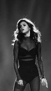 Downaload Selena Gomez Performance On Stage Monochrome Wallpaper For Screen 720x1280 Samsu Selena Gomez Concert Selena Gomez Outfits Selena Gomez Wallpaper