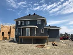 Please click on a color above to see a larger view. Gentek Midnight Surf Vinyl Siding Traditional House Exterior Houzz Uk