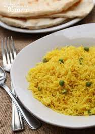 Basmati Rice With Turmeric And Peas Turmeric Recipes Basmati Rice Recipes Indian Food Recipes