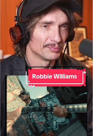 Robbie Williams' New Rock Song: A Music Review