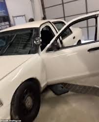 Head to the far side of. Near The Vehicle Mechanic Films Lock And Unlock Haunted Police Car Doors Video World Latest News Headlines