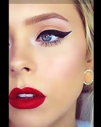 Can anyone recommend a good vintage hair and make-up artist?