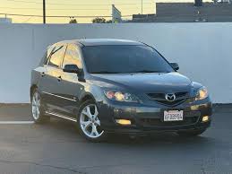 Image result for Sparkling Black 2007 Mazda3