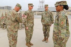 The big red one isn't so much a war movie as it is a message, sometimes obscure, of what war is really like. Big Red One Soldiers Don Shoulder Sleeve Insignias In Patching Ceremony Article The United States Army