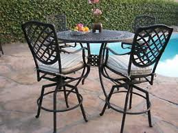 Patio set with 4 chairs, 2 of which are rockers, oval table, made of wrought iron, green. Cbm Cast Aluminum Outdoor Patio Furniture 5 Piece Bar Table Set B 4 Swivel Stool 609722580335 Ebay