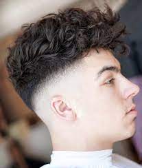 The man bun is one of the most popular modern hairstyles for men, and the good news is that it is a style that particularly suits men with long curly hair. 35 Best Curly Hair Haircuts Hairstyles For Men 2021 Update