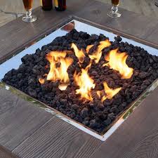 Lava rocks can be used in landscaping. Starfire Designs Outdoor Volcanic Lava Rock 10 Lbs Fire Pit With Rocks Fire Pit Materials Fire Pit Lava Rocks