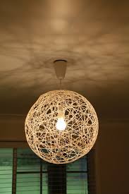 This is how you make a globe pendant light like a pro. Diy Pendant String Light The Whimsical Wife Cook Create Decorate