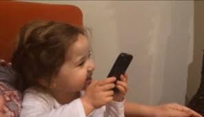Adorable toddler meets, falls in love with Siri