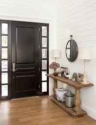 Maybe you would like to learn more about one of these? Ebony And Ivory Shiplap And Sidelights There S So Much To Love In This Foyer Of Twope Black Front Door Interior Apartment Decorating Black Black Entry Doors