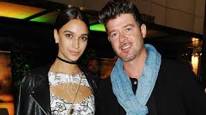 Because she's now hanging out with his kid. Robin Thicke And April Love Geary Welcome Baby No 3 Entertainment Tonight
