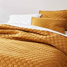 Step up your bedding game and instantly add some refreshing style to your room decor with our quilts. Fontaine Mustard Yellow Cotton Quilts And Pillow Shams Crate And Barrel