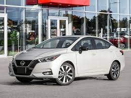 You press the unlock button on the key fob, but the car door latch. Spinelli Nissan 2021 Nissan Versa Sr 210103 In Pointe Claire