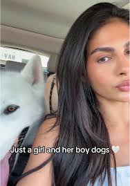 A Girl and Her Adorable Boy Dogs