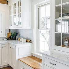 This album shows a kitchen backsplash with ubkitchen cabinets, large 35 x 12.5 white wave pattern tile. 75 Beautiful White Kitchen Backsplash Pictures Ideas Houzz