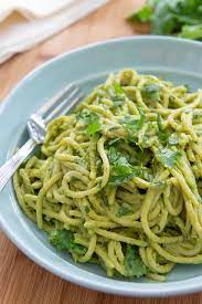 A cavolo nero and pea puree is tossed with spaghetti to created this delicious and verdant dish. Green Spaghetti Pasta With A Spicy Poblano Cream Sauce