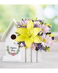 Arrangement of yellow blooms with bright yellow lilies, alstroemeria, carnations and chrysanthemums in a square glass vase. Happiness Blooms By 1800flowers In Los Angeles Ca 1 800 Flowers Conroys