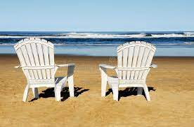 beach chairs two empty chairs from a resort on the beach affiliate empty chairs beach beach resort ad beach chairs chair outdoor chairs