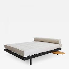 A double bed can become a daybed with a few adjustments. Jean Prouve Jean Prouve Double Daybed